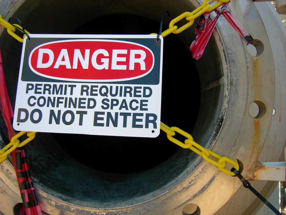 confined spaces can be extremely dangerous and must be marked with a sign.