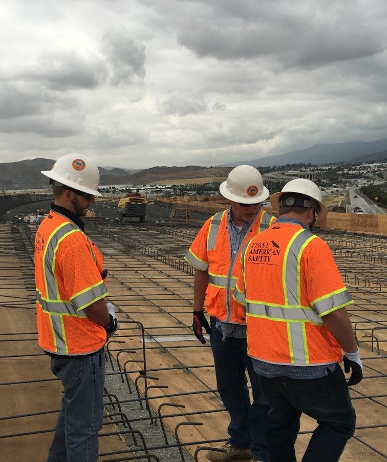 Safety training happening at a construction site.
